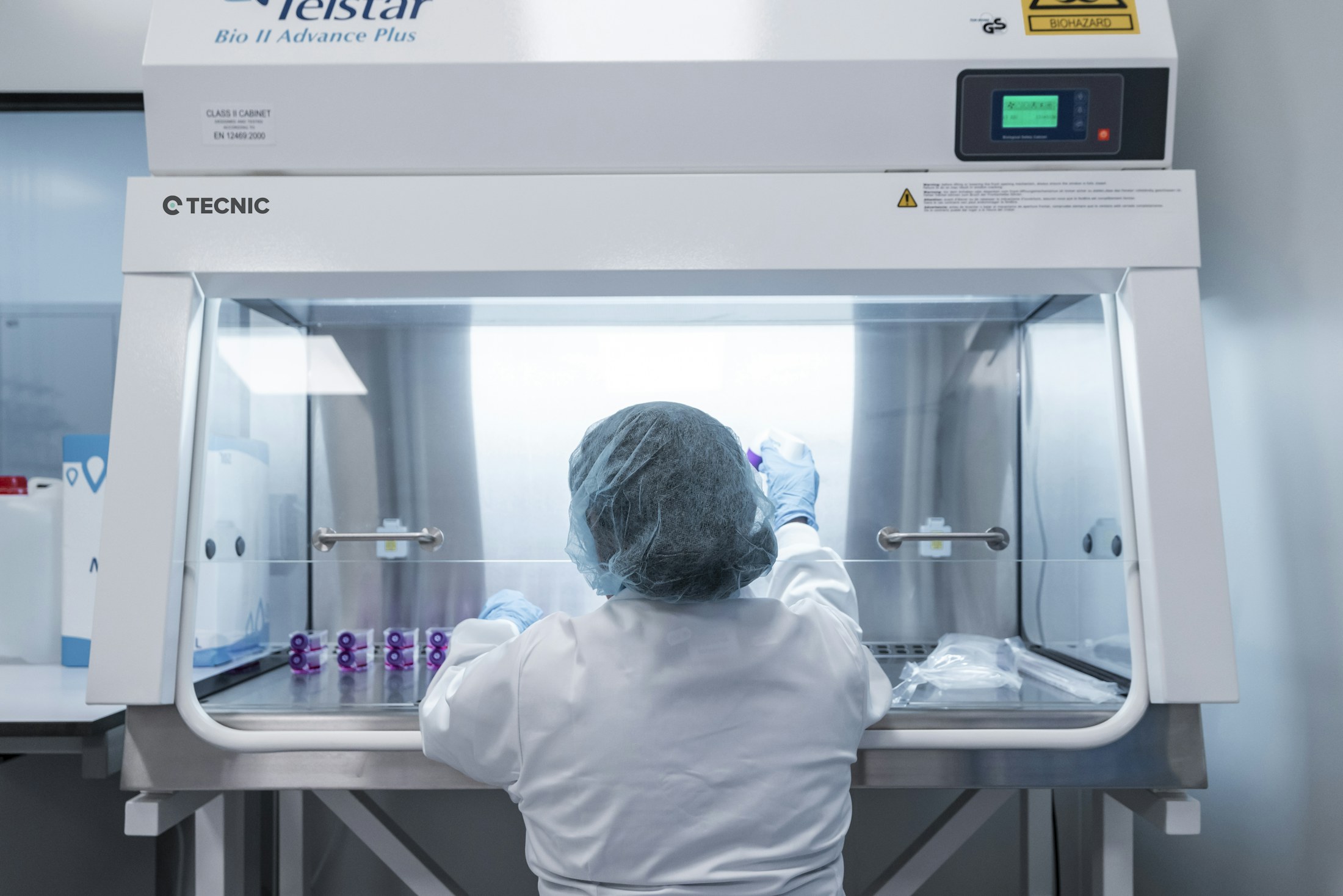 Scientist working with advanced laboratory instrumentation